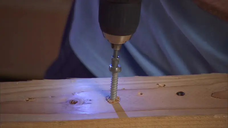 The stripped bolt backed out of the board on the end of the extractor